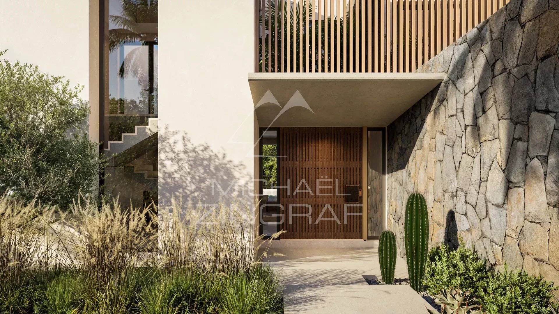 Entrée d'une villa de luxe à Heritage Villas Valriche avec des plantes et des éléments en pierre.
