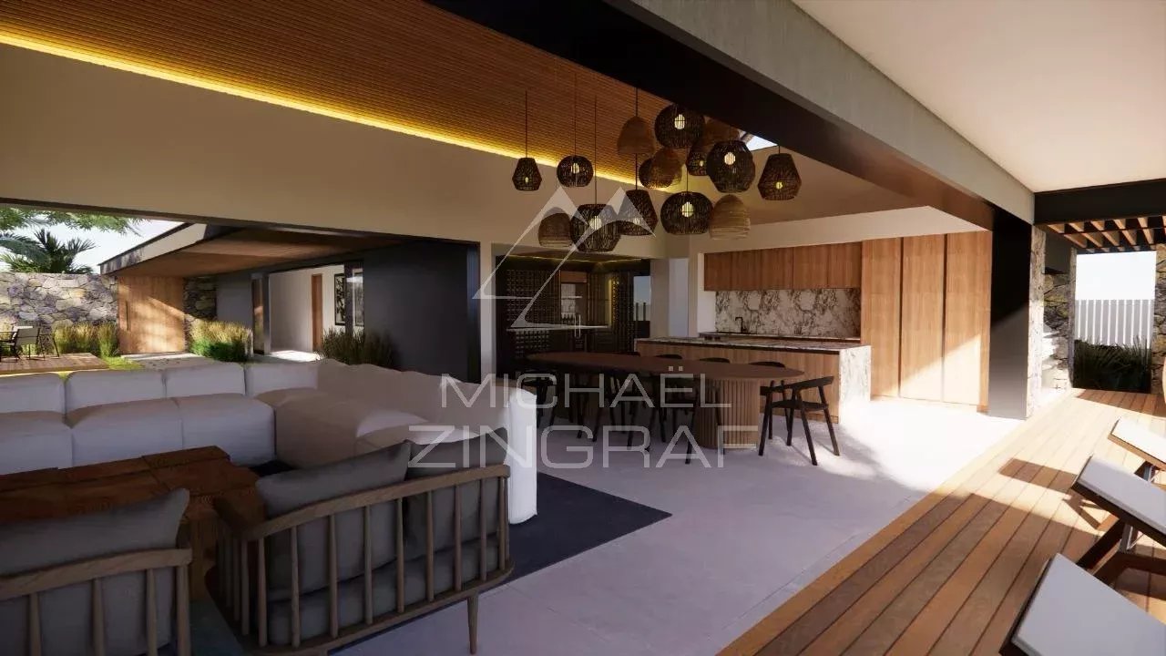 Intérieur d’une villa contemporaine à Mont Choisy Intérieur d'une villa contemporaine avec salon et espace repas, lumière naturelle