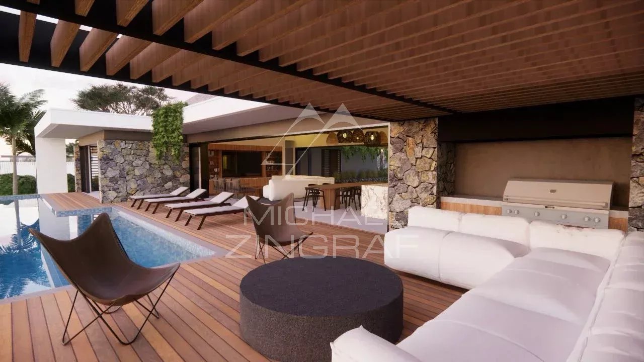 Villa contemporaine à Mont Choisy Villa contemporaine avec piscine et terrasse en bois dans un domaine de golf.