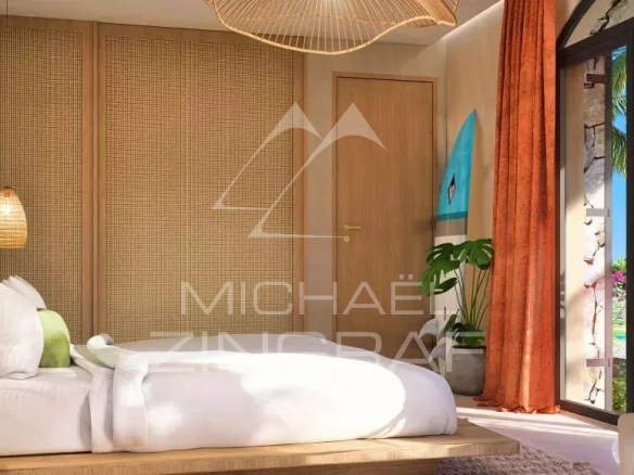 Chambre d'une villa bioclimatique avec vue sur la piscine et le jardin tropical à Baie du Cap.