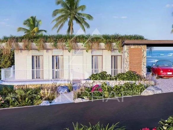 Villa bioclimatique moderne avec piscine privée, entourée de végétation tropicale à Baie du Cap.