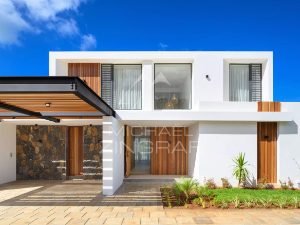 Villa moderne de 4 chambres à Haute Rive avec jardin et garage.