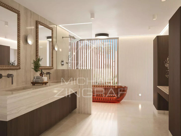Salle de bain moderne avec baignoire et double vasque dans une villa de luxe.