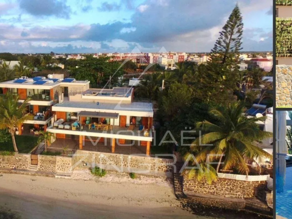 Elegant 2-bedroom beachfront apartment in Pereybere, with terrace and sea view.