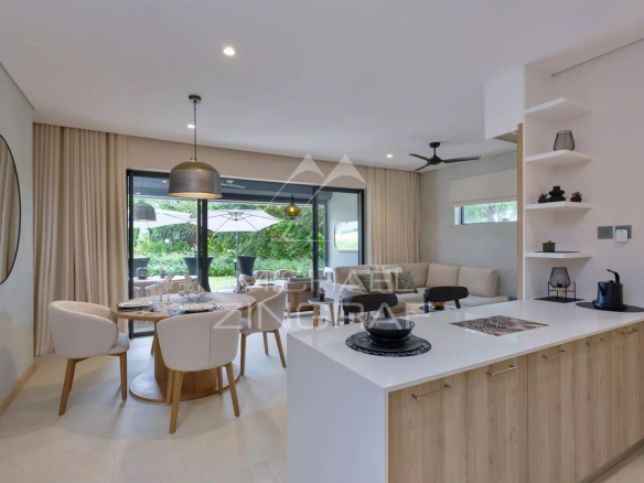 Interior of a modern apartment with living room, dining room and open kitchen, overlooking a garden.