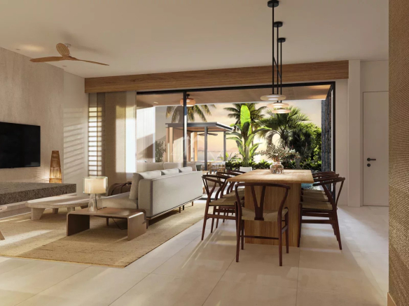Interior of a modern villa with living room and dining room, overlooking a tropical garden.