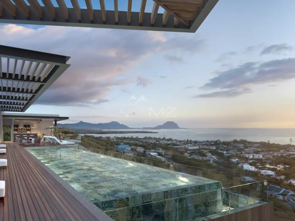 Vue panoramique d'une villa moderne avec piscine à débordement surplombant la mer à Rivière Noire.