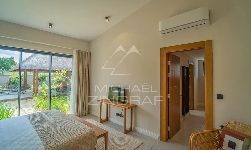 Chambre de la Villa Clusia à Tamarin Chambre d'une villa contemporaine avec vue sur la nature à Tamarin.