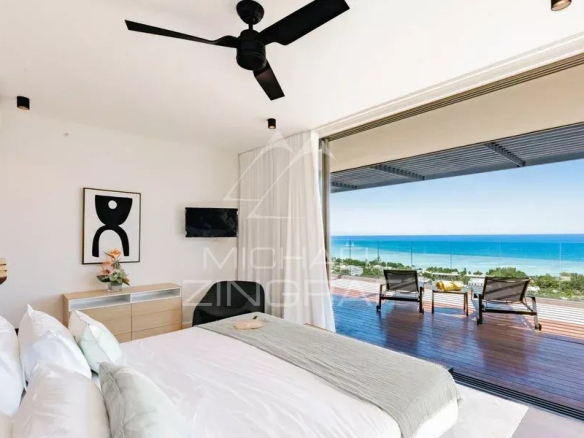 Chambre d'appartement avec vue sur l'océan et terrasse à Rivière Noire.