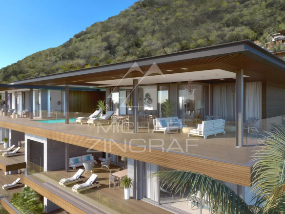 Appartement moderne avec terrasse et piscine, vue sur la montagne et l'océan.