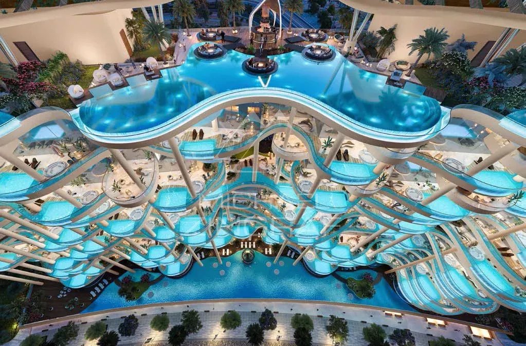 Résidence de luxe à Dubaï Vue aérienne d'une résidence de luxe à Dubaï avec piscine et espaces de détente.