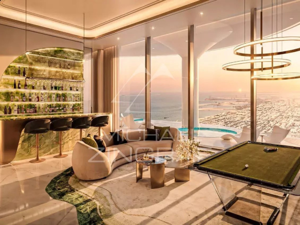Intérieur d'une résidence de luxe à Dubaï avec bar, billard et vue sur la mer.
