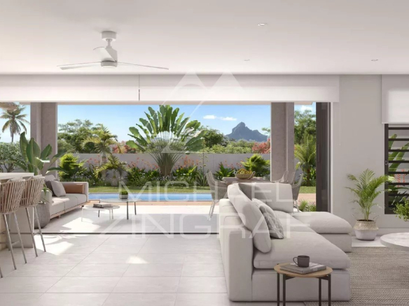 Interior of a contemporary villa with living room, kitchen and garden view in Tamarin.