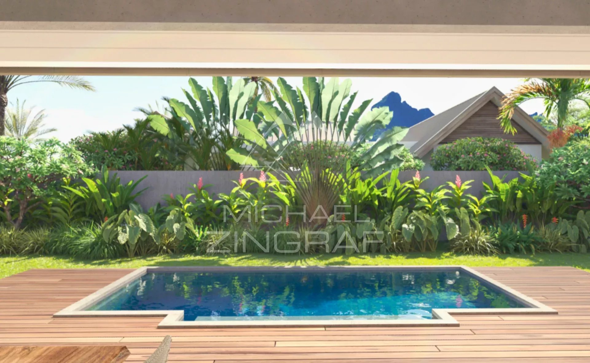 Contemporary villa in Tamarin View of a swimming pool surrounded by greenery in a contemporary villa in Tamarin.