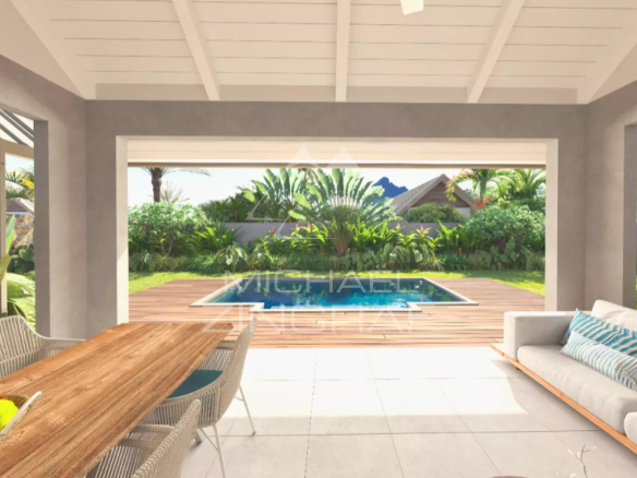 Interior of a contemporary villa overlooking the pool and garden in Tamarin.