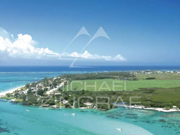 Aerial view of Pointe d'Esny with lagoon and surrounding nature.