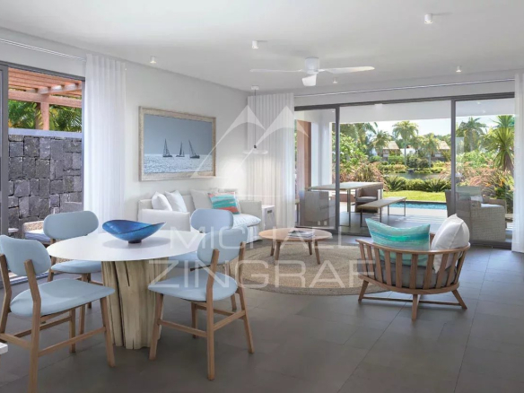 Interior of a duplex in Pointe d'Esny with a view of the pool and garden