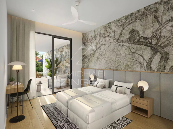 Chambre d'appartement moderne avec lit double et décor mural artistique à Balaclava.