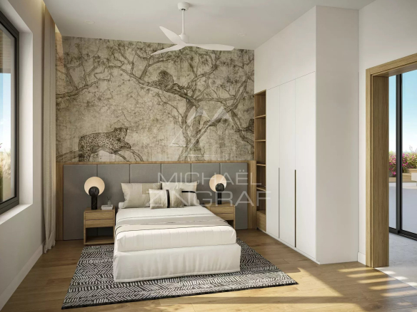 Modern bedroom with a bed, bedside tables and artistic wall decor.