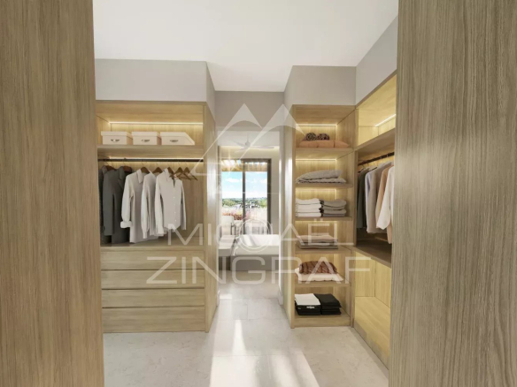 Interior of a modern dressing room with well-organized clothes and accessories.