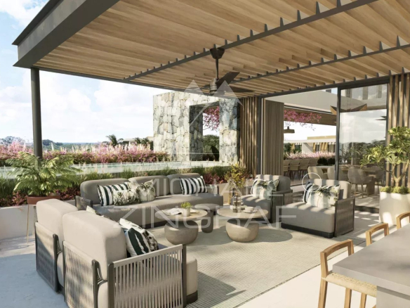 Modern terrace of a penthouse in Balaclava with elegant furniture and views of a tropical garden.