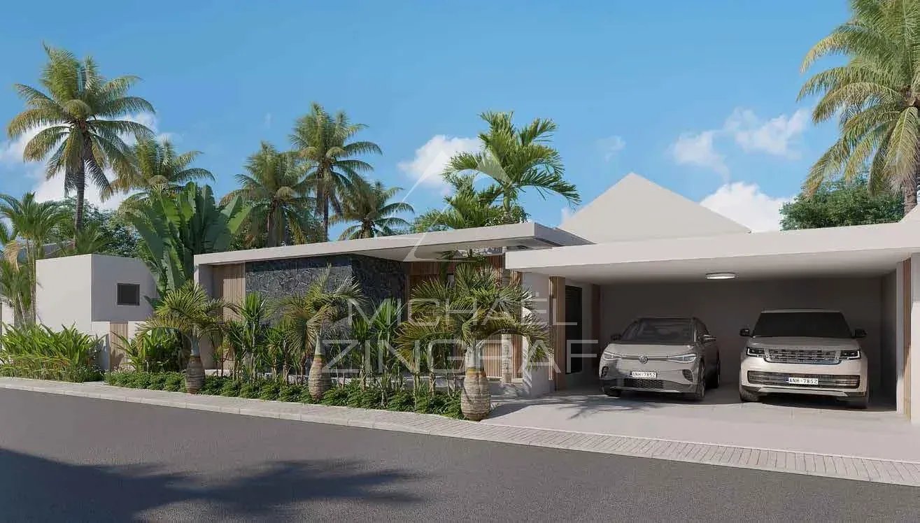 Villa moderne à Grand Baie Villa moderne avec trois chambres et garage, entourée de palmiers à Grand Baie, Île Maurice.