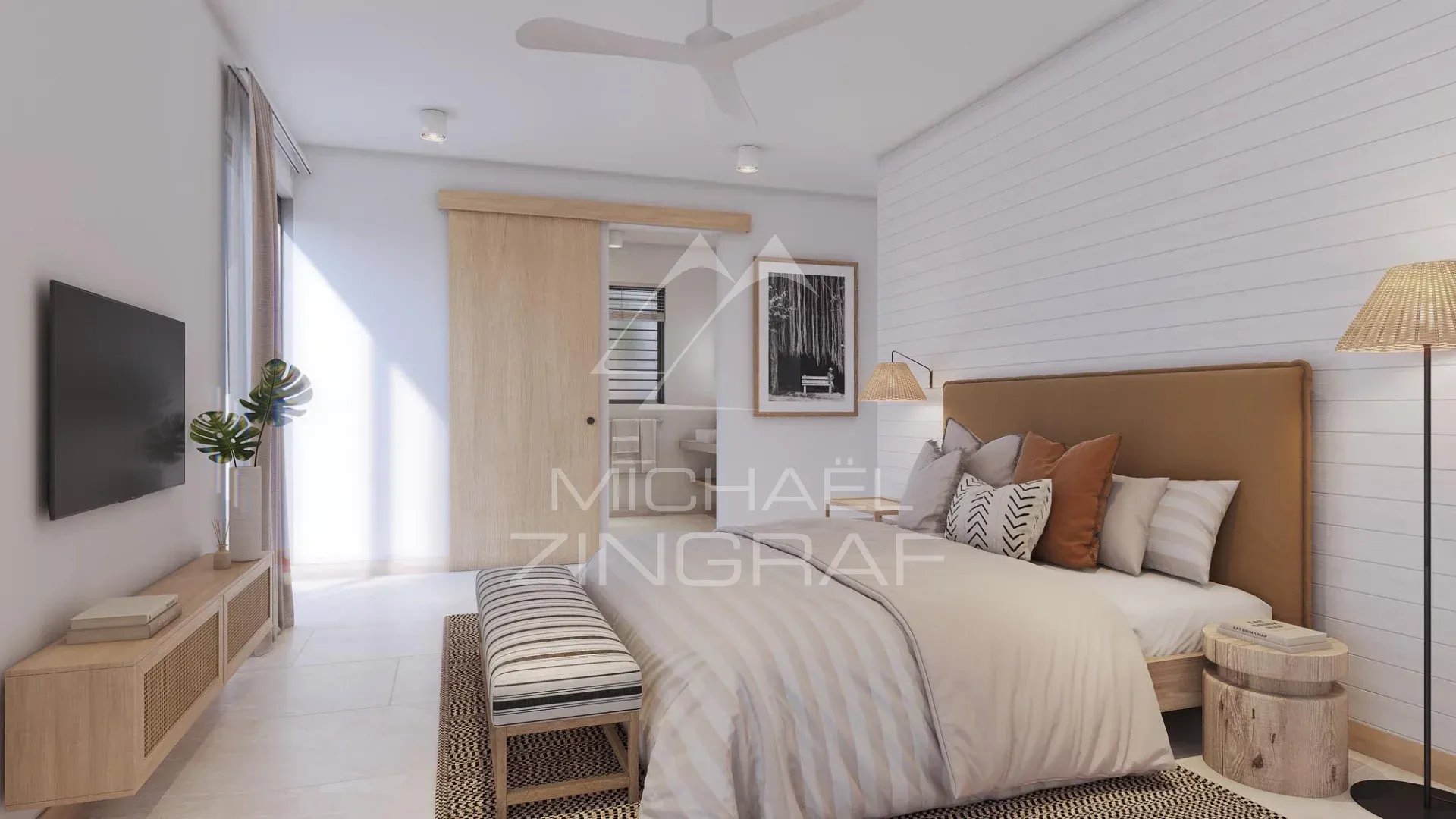 Chambre de villa à Grand Baie Chambre d'une villa moderne avec lit, télévision et décoration minimaliste.