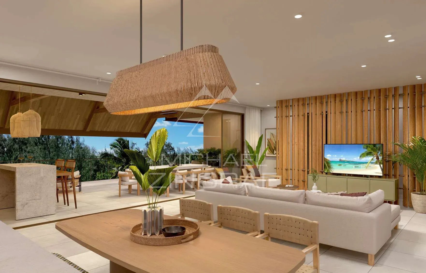 Penthouse moderne à Anse La Raie Intérieur d'un penthouse moderne avec salon, cuisine et décoration naturelle à Anse La Raie, Île Maurice.