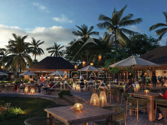 Terrasse d'un restaurant avec tables en bois et lanternes, entourée de palmiers à Anse La Raie, Île Maurice.