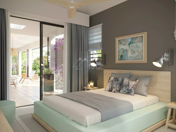 Chambre moderne d'une villa contemporaine à Petite Rivière Noire, Île Maurice, avec accès à un patio.