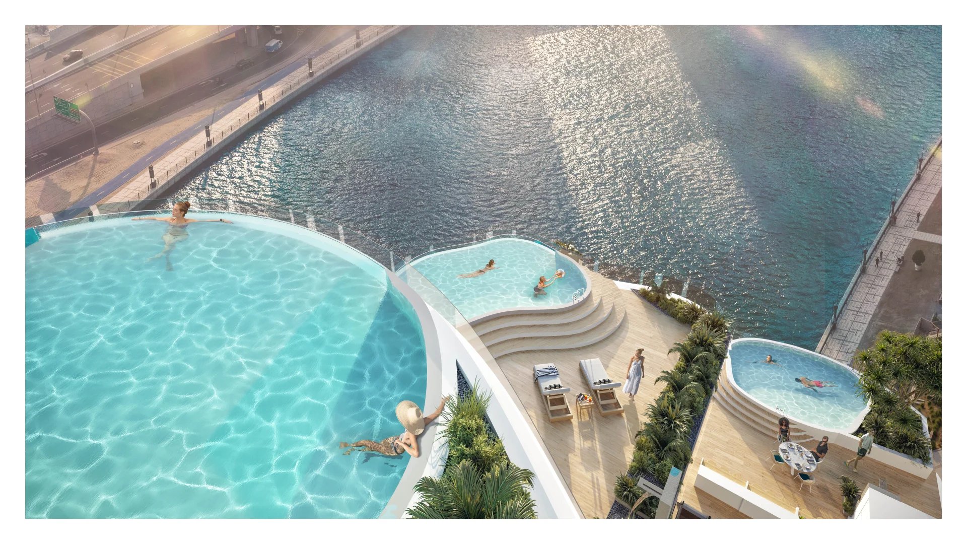 Loft d’exception à Dubaï Vue aérienne d'une piscine à débordement et de terrasses dans un loft à Dubaï, avec des baigneurs.