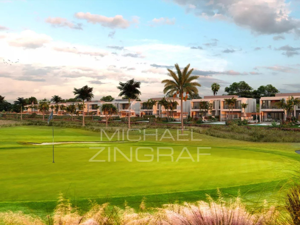 View of a contemporary villa under construction with a golf course in the foreground in Haute Rive.