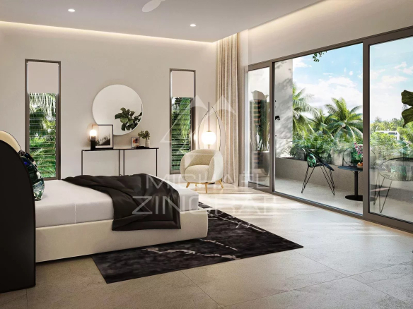 Chambre moderne avec accès à un balcon et vue sur la végétation à Pereybere.