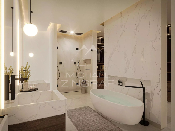 Salle de bain moderne avec baignoire et douche dans un penthouse à Pereybere.
