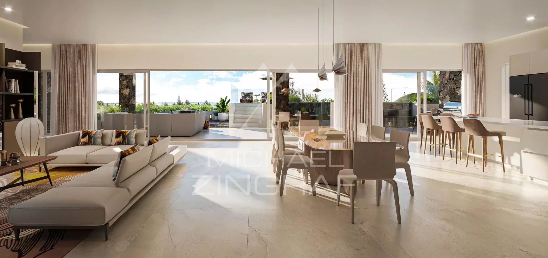 Intérieur d'un penthouse moderne avec vue sur la mer à Pereybère, espace de vie lumineux et mobilier contemporain.