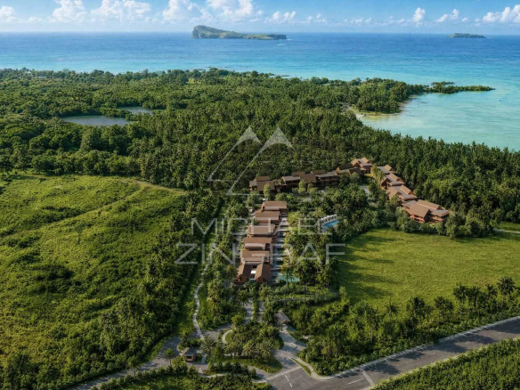 Vue aérienne du projet Les Palétuviers à Anse La Raie, Île Maurice, entouré de nature et de mer.
