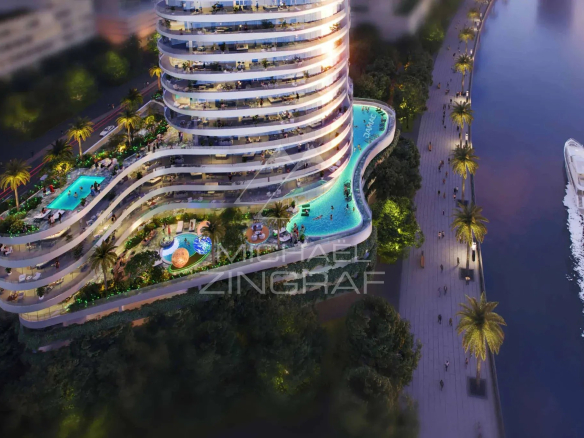 Vue aérienne d'un duplex moderne à Dubaï avec piscine et espaces verts.
