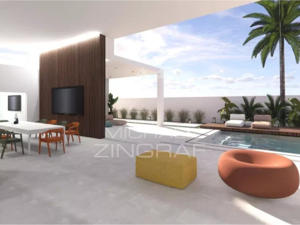 Intérieur d'une villa moderne avec piscine privée à Grand Baie, mobilier contemporain et espace de vie extérieur.