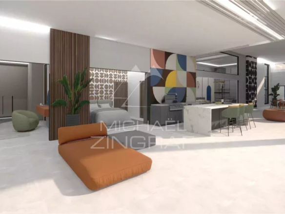 Intérieur moderne d'une villa de luxe avec salon, cuisine et espace repas à Grand Baie.
