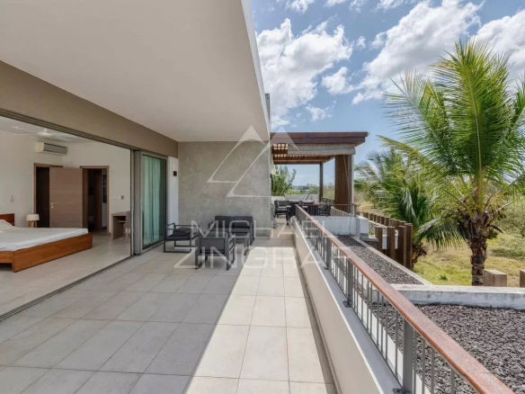 Terrace of a contemporary penthouse overlooking the golf course in Mont Choisy, Grand Baie.