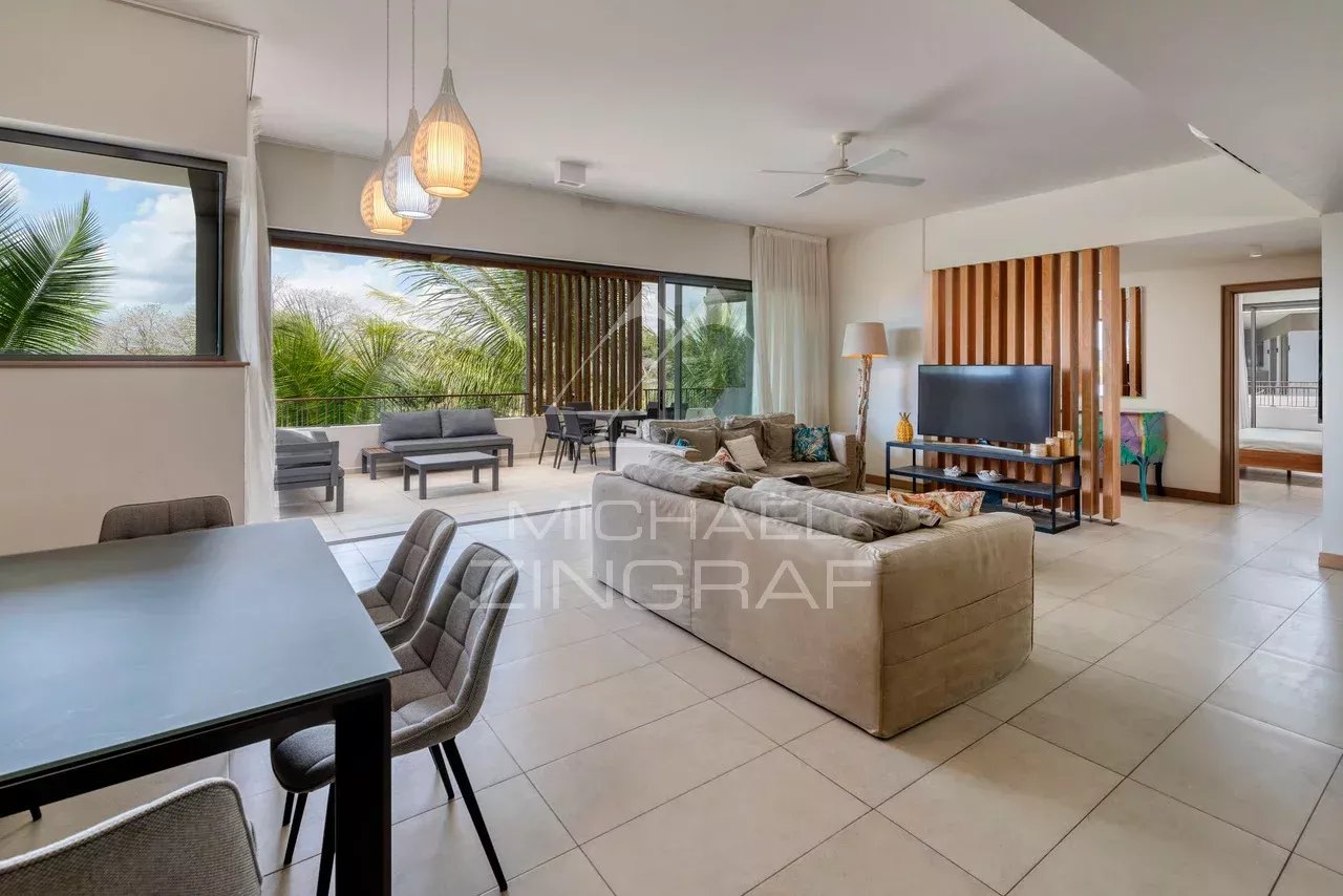 Contemporary penthouse in Mont Choisy Interior of a modern penthouse with views of nature, spacious living room and contemporary furniture.