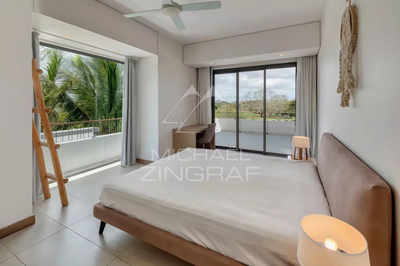 Penthouse room at Mont Choisy Room in a contemporary penthouse with golf views in Mont Choisy, Grand Baie.