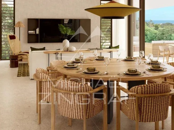 Intérieur moderne de la Villa Vacoas avec salle à manger et salon lumineux à Bel Ombre.