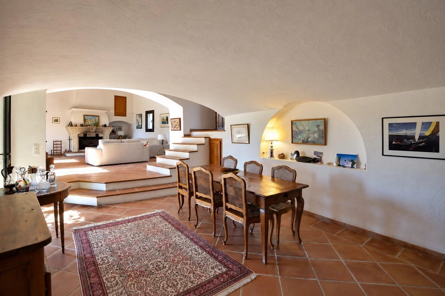 Interior of a Provençal property in Callian Interior of a Provençal property with a bright dining room and living room in Callian.