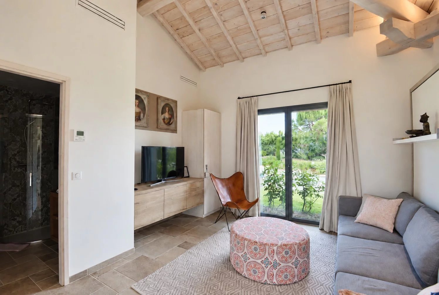 Interior of the luxury villa in Terre Blanche Interior of a contemporary villa with a bright living room and access to the outside.