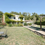Near village Contemporary villa with outbuilding