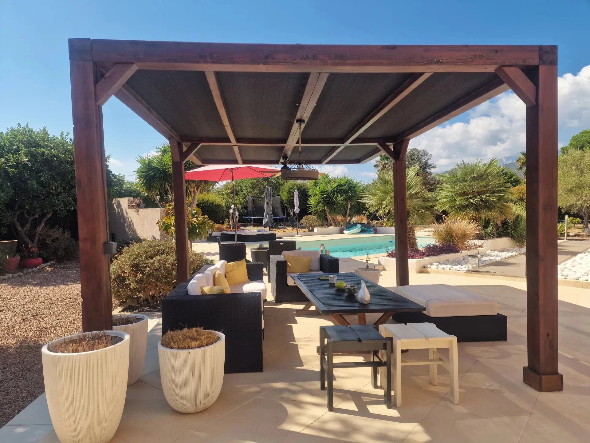 Villa terrace with swimming pool in Corsica Terrace with garden furniture and swimming pool in the Marina of Solaro, Corsica.