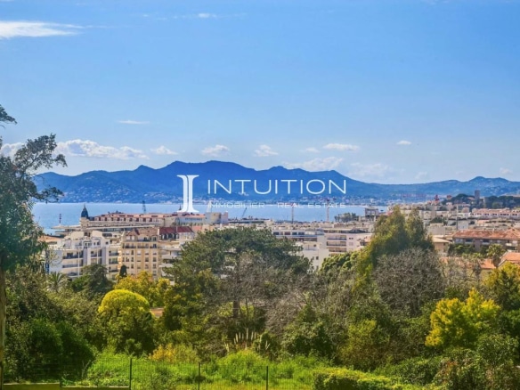 Unobstructed view of the sea and hills from an apartment in Cannes.