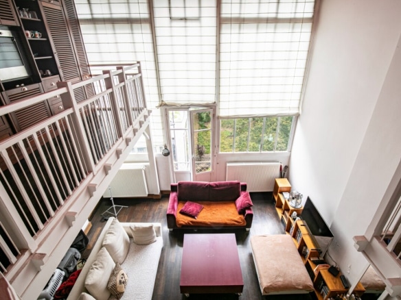 Bright triplex artist's studio with 5m high ceilings, located in Paris 16th arrondissement.
