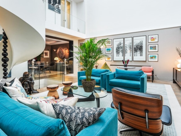 Interior of a private mansion in Paris 7, living room with modern furniture and works of art.